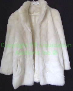 lot 29 image: Faux fur evening jacket, brand unknown