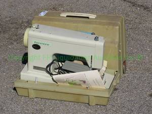 lot 144 image: Sears Kenmore sewing machine, model number 158.12310