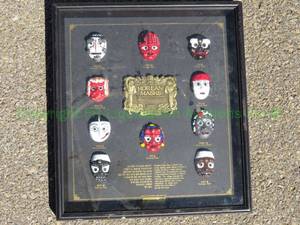 lot 132 image: Korean Masks collectable plaque, promotional by Samsung Areospace
