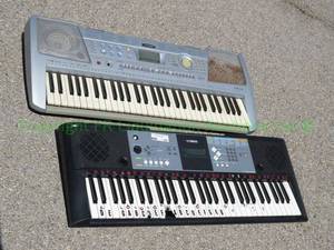 lot 108 image: Yamaha PSR-292 and PSR-E233 electric keyboards