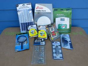 lot 118 image: Kidde smoke alarm and assorted hand tools, including multi-tool, screwdriver set, tape measures and more