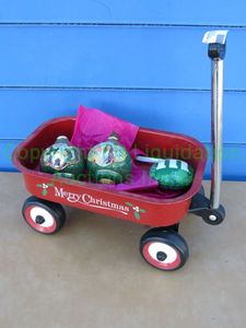 lot 114 image: The Wizard of Oz and M&Ms Christmas ornaments with mini wagon