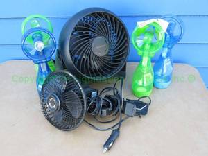 lot 130 image: Honeywell desk fan, O2Cool water spray fans, and Axius car fan