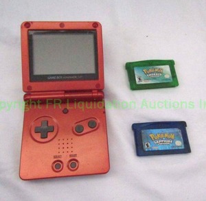 lot 67 image: Nintendo Gameboy Advance With Pokemon Emerald and Pokemon Sapphire
