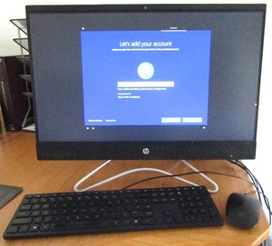 lot 163 image: HP 24-f0051 All-in-One Desktop PC with keyboard and mouse, in excellent working condition.