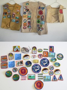 lot 124 image: YMCA Y-Indians leather vests with patches and Boy Scouts of America brass belt buckle (Made in USA)