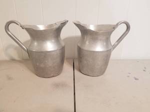 lot 12 image: Pair of Aluminum pitchers (B)