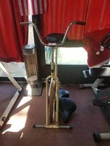 lot 91 image: Huffy stationary bike with extra seats (A)
