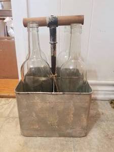 lot 146 image: Clear bottles and metal carry case decor. (C)