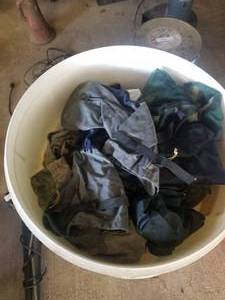 lot 258 image: Selection of Hunting clothes - Cabelas coat, camo-vest, socks, etc. and containers (G)