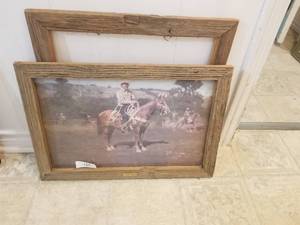 lot 150 image: Frames made from lumber from Fort Worth Stockyards, one has a cowboy print