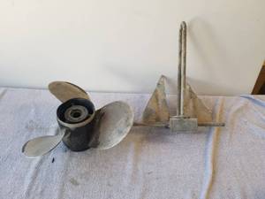 lot 23 image: Boat prop and anchor