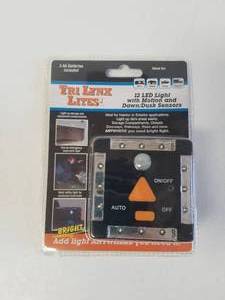 lot 33 image: LYNX 12-LED LIGHT WITH MOTION AND DAWNDUSK SENSORS  BLACK- #00027B