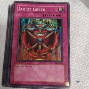 lot 52 image: RARE JAR OF GREED YUGIOH CARD
