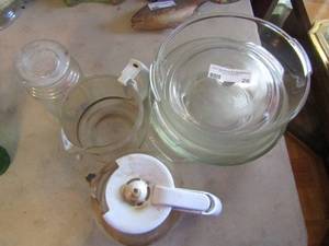 lot 26 image: 2 coffee pots, casserole dishes, glass pot lids covered candy dish