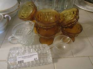 lot 41 image: 7 brown glass yogurt cups, creamer, and covered butter dish