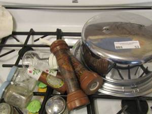 lot 53 image: Metal covered cake pan, syrup jar, set wooded S&P plus 3 other sets