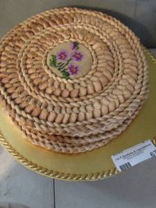 lot 67 image: 16 plate chargers   4 wicker pot holders