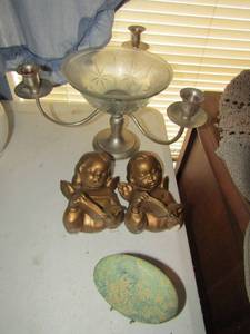 lot 85 image: 3 tier candle stand with bowls in middle 2 cherubs