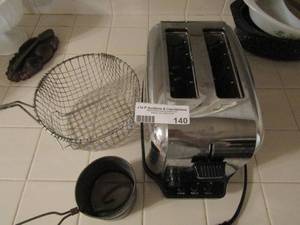 lot 140 image: Cuisinart toaster frying basket 10 measuring cups