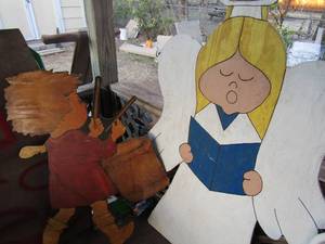 lot 128 image: Yard art- Drummer boy 42x27 and 54x32 wooden angel