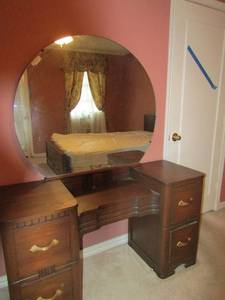 lot 9 image: 29 vanity with mirror 63 52x18  4 drawer  mirror 36x41 oval flat bottom  antique