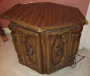 lot 175 image: Octagon side table inside storage 2 doors open wide 19x23x26