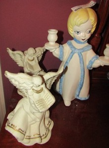 lot 179 image: Two 7 single candle holders angels- 12 angel with 2 CS holders