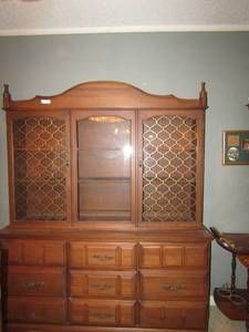 lot 8 image: Dark brown wood china hutch 2 doors and 3 drawers on bottom Top has 2 glass  doors 3 tier shelving 73x61x18