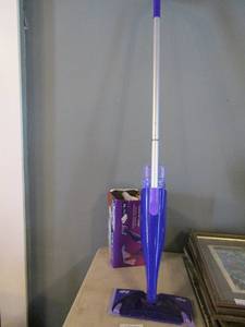 lot 201 image: Swiffer wet jet with full bottle of cleaner and a few pads