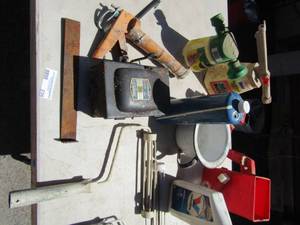 lot 236 image: Misc. lot- square electric box, caulking gun, yard Miracle grow  sprinklers