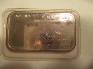 lot 36 image: One Troy Ounce .999 Fine Silver Bar, Silvertowne, Winchester Indiana