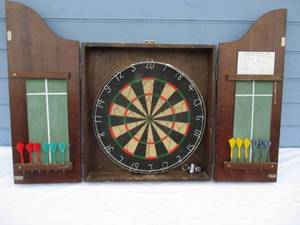 lot 131 image: Dart Board With Darts