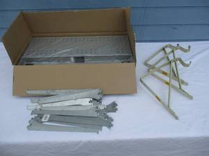 lot 139 image: LOT Of 2-New in the box 24 x 9 Metal Shelfs ,3-Shelf Braces and lot of 12 Utility Brackets