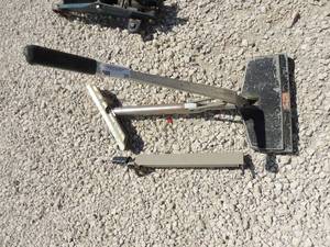 lot 26 image: Carpet stretcher WITH Extends poles
