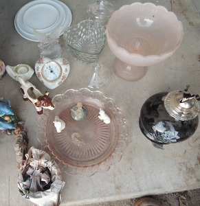 lot 157 image: Assorted Figurines, heart clock, cotton ball dish, pink depression glass dish, pink vase black oil lamp no chimney
