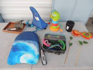 lot 147 image: Hair accessories, kids swim and sprinkler toys outdoor lights, grill tools and Bluetooth speaker