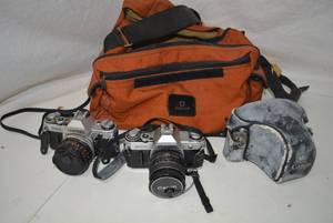 lot 2 image: Vintage Cameras with Bag  Canon AT-1 , AE-1  2302123, Canon AV-1 with Case