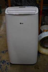 lot 4 image: LG Portable Air Conditioner Model LP1018WNR, Rarely Used