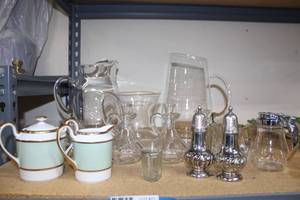 lot 71 image: Dining Service Lot Fitz and Floyd Cream and Sugar, Silverplate Shakers, Tiny Glass Spoons, Glass Pitchers and More