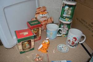 lot 128 image: Precious Moments Mugs and Lighted Tree Ornaments, Garfield Tree Ornaments, Earrings and Necklace Set and More