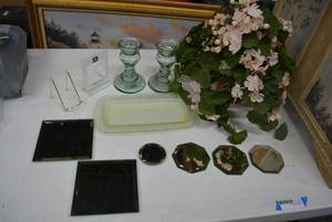 lot 155 image: Home Dcor Peach Colored Flower Arrangement, Green Glass Candle Holders, Small Beveled Mirrors, and Glass Tray
