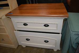 lot 212 image: Laminate Top Lateral File Cabinet (Some Water Damage on Top Edge)