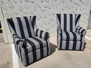 lot 208 image: Pair of Black and White Upholstered Swivel Rocking Chairs