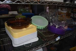lot 252 image: Kitchen and Disney Items Purple Pyrex Pie Plates, Plastic Trays, Cutting Boards, Disney Mugs, Disney Plastic Pitcher and More