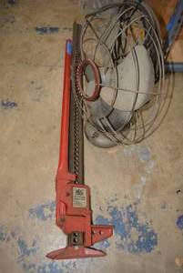 lot 271 image: 48  3-12 Ton Tall Jack and Vintage Metal Westinghouse Fan