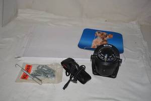 lot 323 image: Dashboard Compass, Mouse Pad, Taser, Laminating Sheets, Hooks as shown