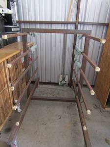 lot 63 image: Metal  rolling rack 49x34  stock wood