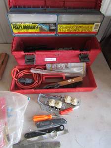 lot 91 image: Red tool box with tools ( screwdrivers, light switches, fuses, jigsaw blades and more 2 drawer parts organizer