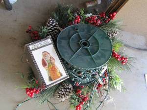 lot 100 image: Holiday door hanger and 100  yard roll of Christmas multi color lights